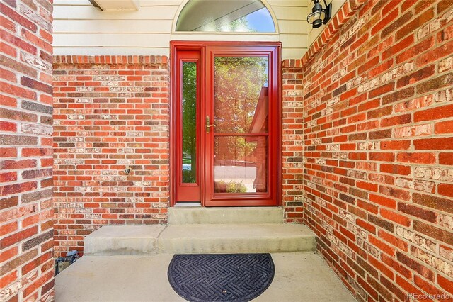 1624 Daphne St, Broomfield, CO 80020 - entrance to property featuring brick siding