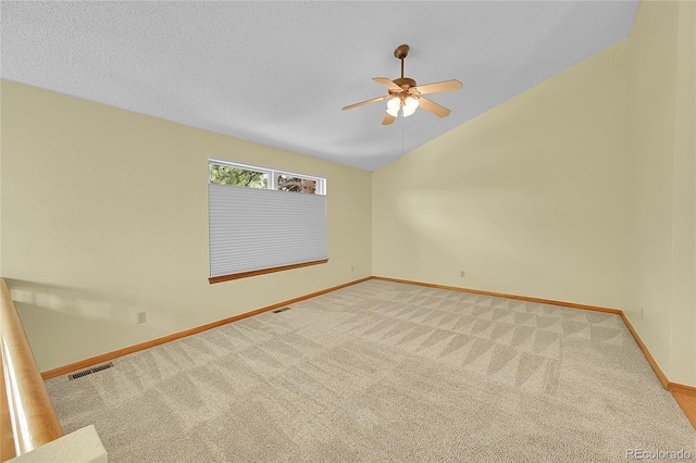 1624 Daphne St, Broomfield, CO 80020 - empty room featuring ceiling fan, lofted ceiling, and carpet floors