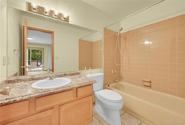 1624 Daphne St, Broomfield, CO 80020 - full bathroom featuring tile patterned floors, vanity, and shower / bath combination