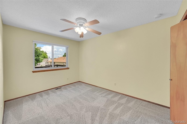 1624 Daphne St, Broomfield, CO 80020 - carpeted spare room with a ceiling fan, a smoke detector, and a textured ceiling