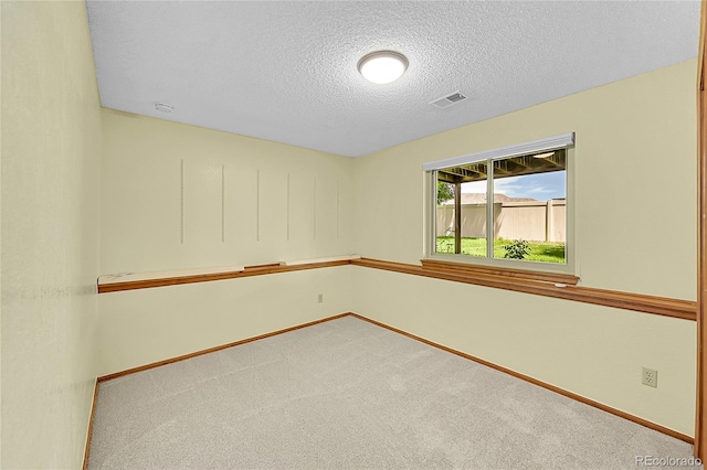 1624 Daphne St, Broomfield, CO 80020 - spare room featuring carpet and a textured ceiling