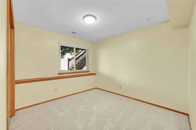 1624 Daphne St, Broomfield, CO 80020 - carpeted spare room with a textured ceiling and a smoke detector