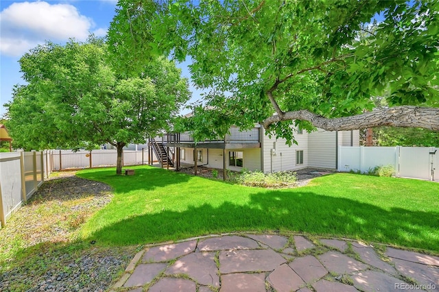 1624 Daphne St, Broomfield, CO 80020 - fenced backyard featuring stairs and a wooden deck