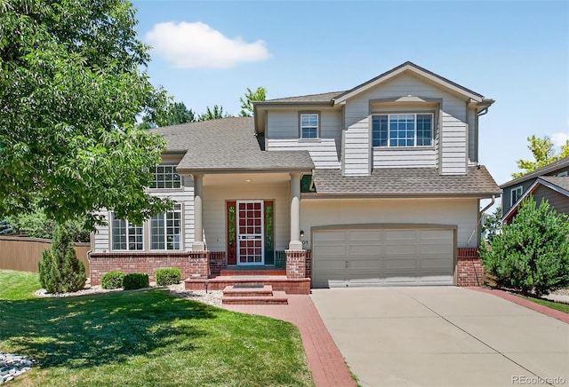 4501 Whitehall Ln, Highlands Ranch, CO 80126 - view of front of house featuring brick siding, an attached garage, concrete driveway, and a front lawn