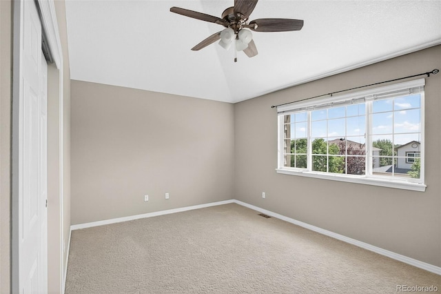 4501 Whitehall Ln, Highlands Ranch, CO 80126 - carpeted spare room featuring vaulted ceiling and ceiling fan