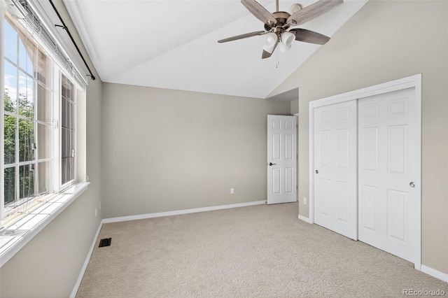 4501 Whitehall Ln, Highlands Ranch, CO 80126 - unfurnished bedroom featuring lofted ceiling, light colored carpet, a closet, and a ceiling fan