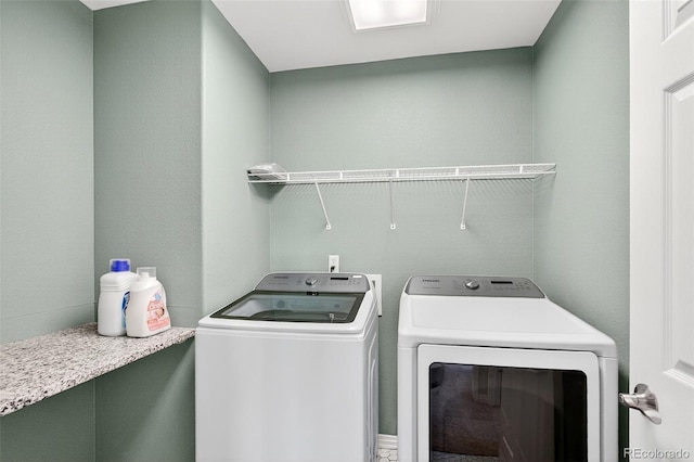 4501 Whitehall Ln, Highlands Ranch, CO 80126 - laundry room with washer and clothes dryer