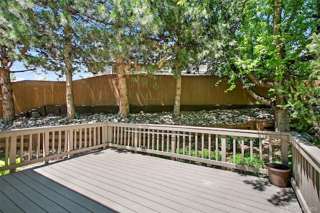 4501 Whitehall Ln, Highlands Ranch, CO 80126 - wooden terrace featuring a fenced backyard
