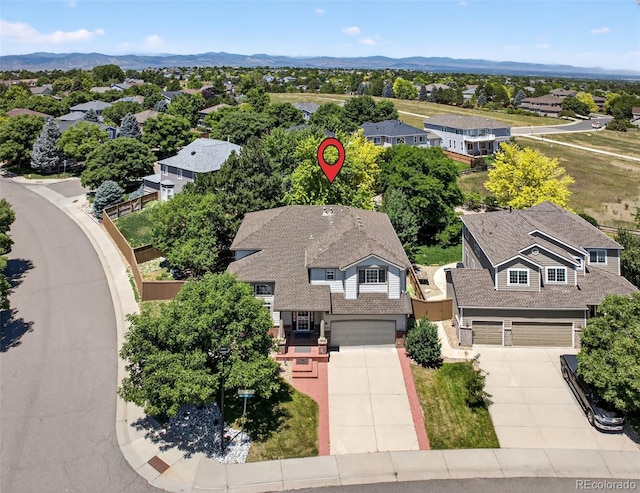 4501 Whitehall Ln, Highlands Ranch, CO 80126 - aerial view of residential area with a mountain backdrop