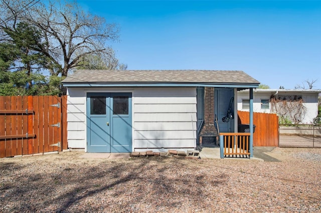 1317 E Uintah St, Colorado Springs, CO 80909 - garage featuring fence and a gate