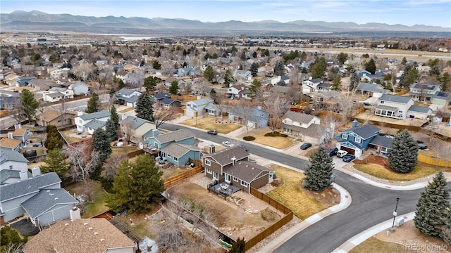 bird's eye view featuring a mountain view and a residential view