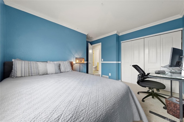 bedroom with carpet, a closet, and crown molding