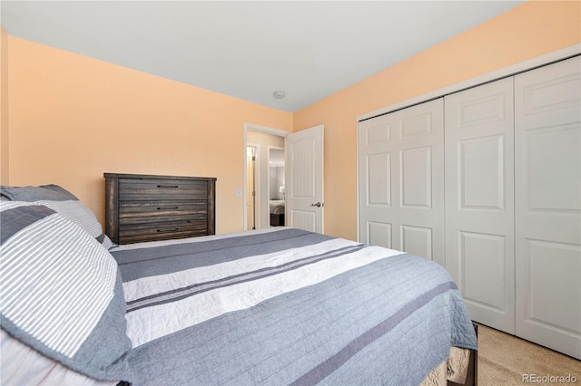 carpeted bedroom featuring a closet