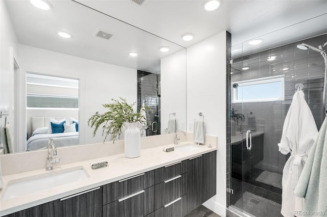3658 Quivas St, Denver, CO 80211 - full bathroom featuring a stall shower, double vanity, recessed lighting, and connected bathroom