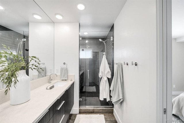3658 Quivas St, Denver, CO 80211 - full bathroom with a stall shower, recessed lighting, baseboards, and vanity