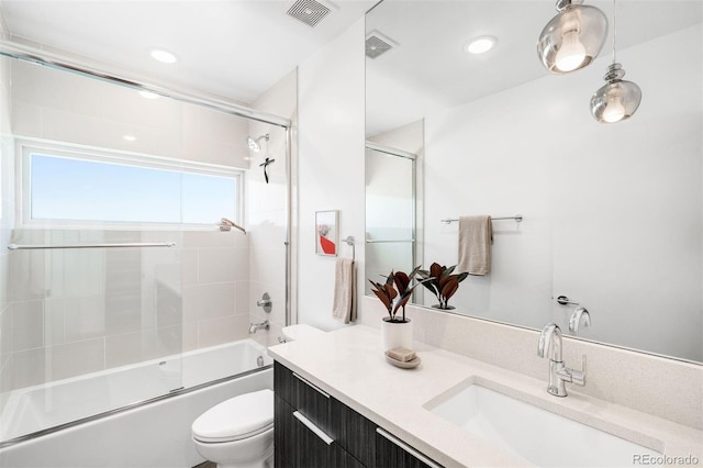 3658 Quivas St, Denver, CO 80211 - full bath with toilet, vanity, shower / bath combination with glass door, and recessed lighting