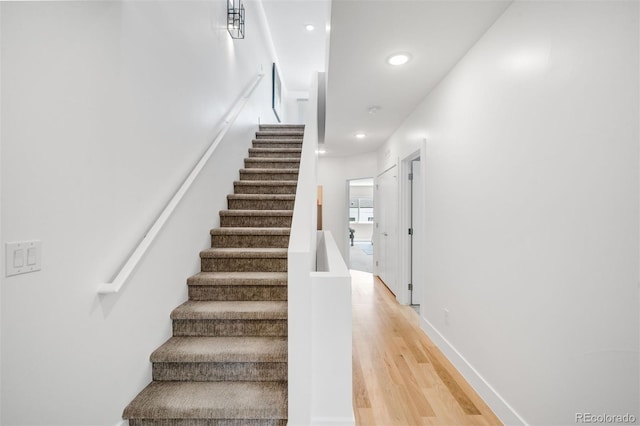 3658 Quivas St, Denver, CO 80211 - stairs with wood finished floors and recessed lighting