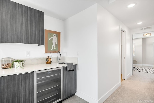 3658 Quivas St, Denver, CO 80211 - indoor wet bar featuring beverage cooler, baseboards, and recessed lighting