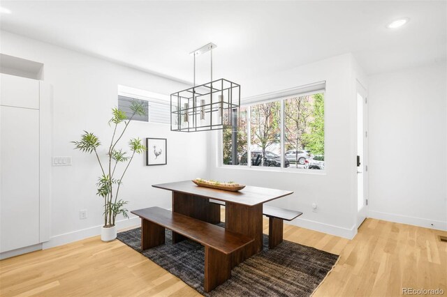 3658 Quivas St, Denver, CO 80211 - dining area with baseboards, healthy amount of natural light, wood finished floors, and recessed lighting