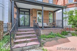 entrance to property featuring covered porch