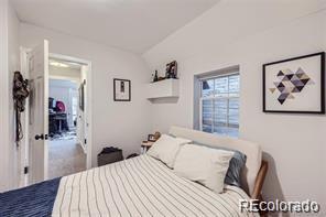 bedroom featuring vaulted ceiling