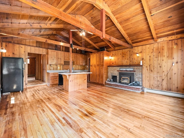 48 Warren Rd, Black Hawk, CO 80422 - kitchen featuring freestanding refrigerator, wooden ceiling, light wood-style floors, and open floor plan