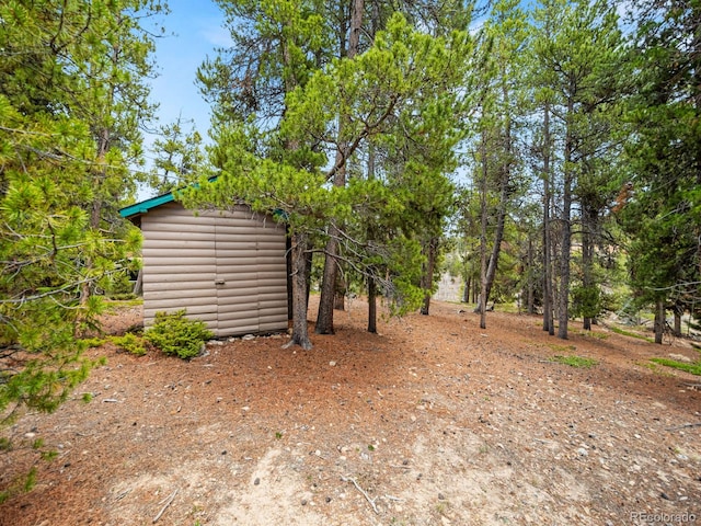 48 Warren Rd, Black Hawk, CO 80422 - view of yard featuring an outdoor structure and a shed