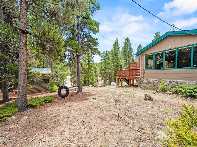 48 Warren Rd, Black Hawk, CO 80422 - view of yard featuring a wooden deck