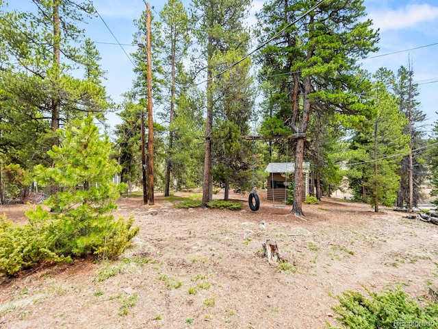 48 Warren Rd, Black Hawk, CO 80422 - view of yard featuring an outbuilding