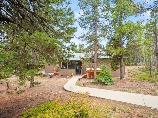 48 Warren Rd, Black Hawk, CO 80422 - view of front of house featuring a jacuzzi and a sunroom