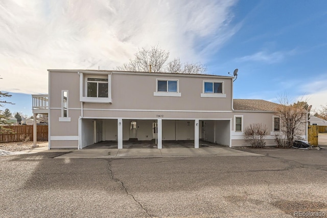 exterior space featuring a carport