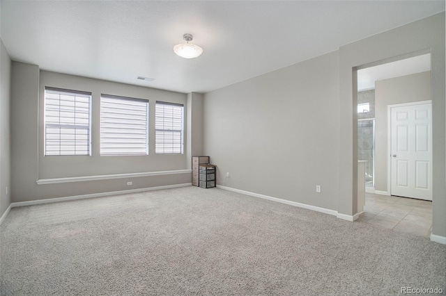 view of carpeted spare room