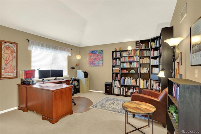 carpeted home office featuring visible vents and baseboards