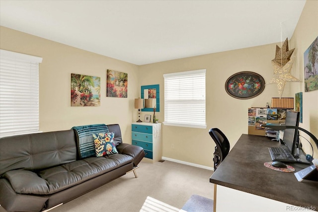 office space featuring baseboards and carpet floors