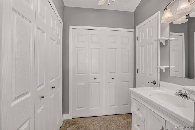 6034 S Parfet St, Littleton, CO 80127 - bathroom featuring a closet and vanity