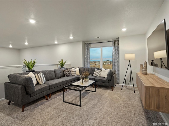 living room with light colored carpet