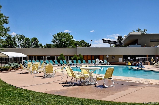 695 S Alton Way Unit 5A, Denver, CO 80247 - community pool featuring a patio area