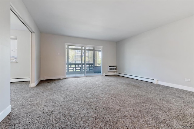 695 S Alton Way Unit 5A, Denver, CO 80247 - carpeted spare room with a baseboard radiator and a baseboard heating unit