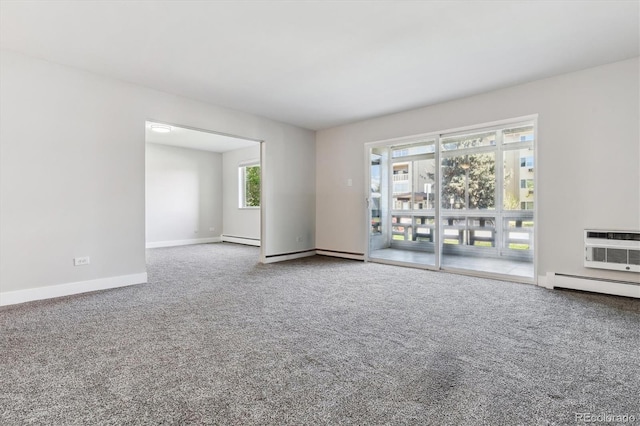695 S Alton Way Unit 5A, Denver, CO 80247 - unfurnished room with baseboard heating and carpet floors