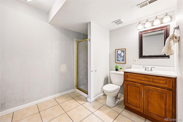 5202 Dillon St, Denver, CO 80239 - bathroom featuring toilet, a stall shower, vanity, and tile patterned floors