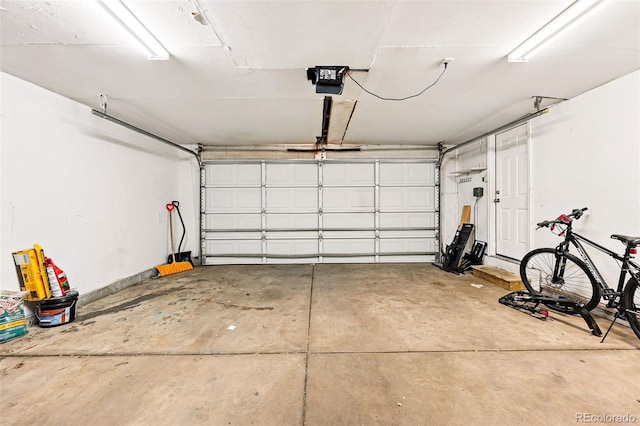 5202 Dillon St, Denver, CO 80239 - garage with a garage door opener