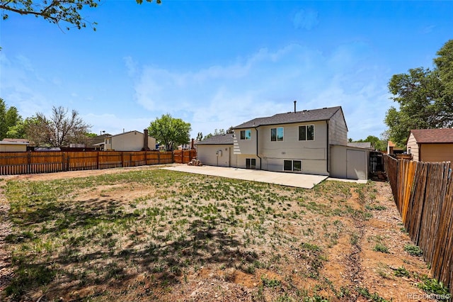 5202 Dillon St, Denver, CO 80239 - back of property with a patio area