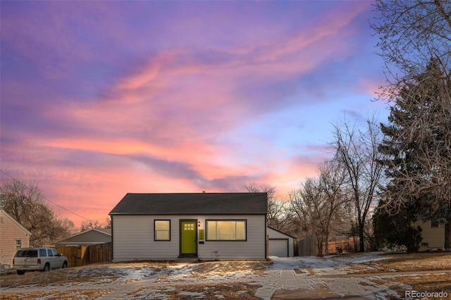 view of front of property with a garage