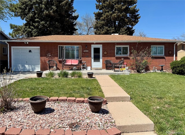 2213 S Meade St, Denver, CO 80219 - ranch-style home with an attached garage, a front lawn, brick siding, driveway, and a shingled roof