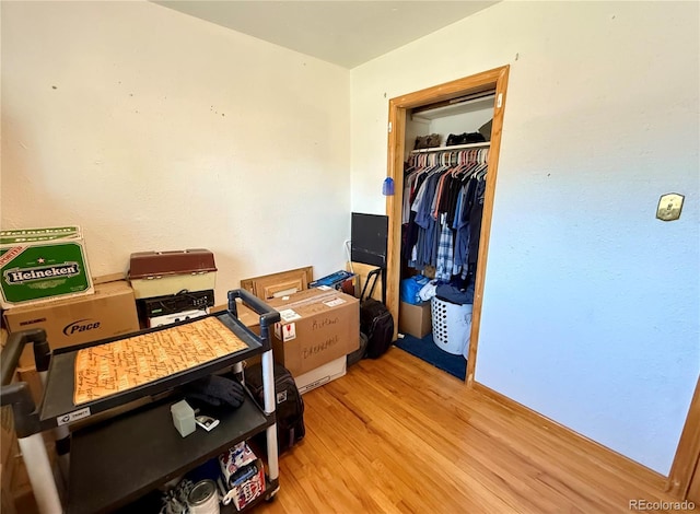 2213 S Meade St, Denver, CO 80219 - bedroom featuring light wood-style floors and a closet