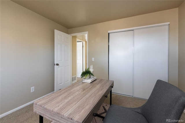 view of carpeted home office