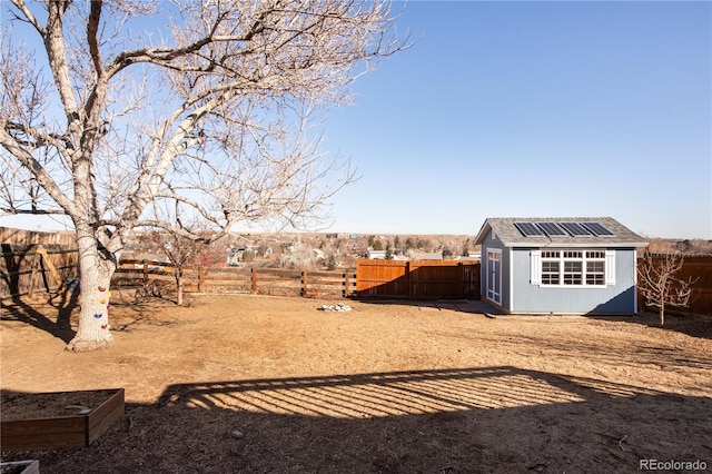 view of yard with a storage unit