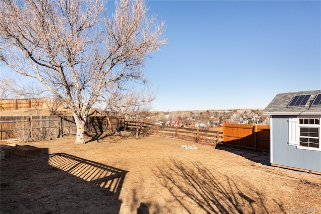 view of yard featuring a storage shed