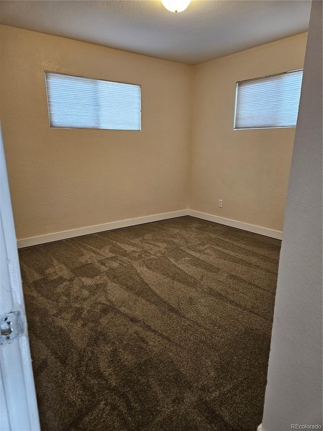 spare room with carpet flooring