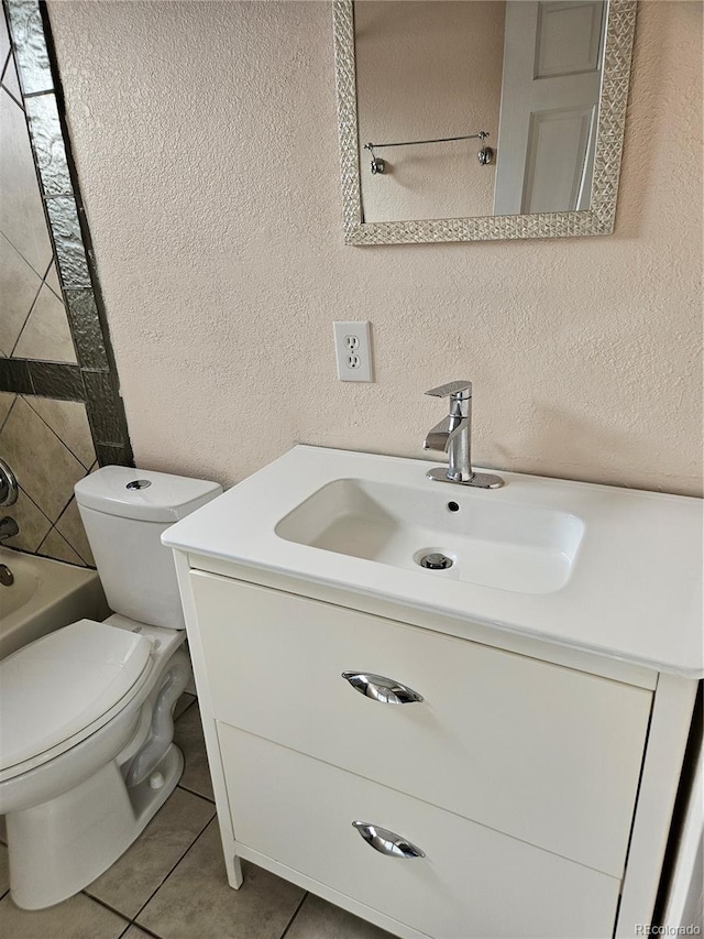 full bathroom featuring tile patterned floors, vanity, toilet, and shower / bathing tub combination